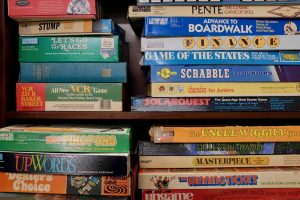 A collection of vintage Parker Brothers board games, including notable titles such as Pente, Solarquest, and the 221B Baker Street VCR Game.