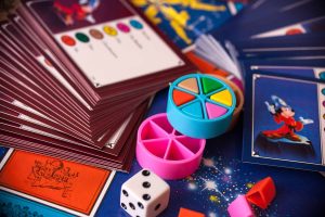A Trivial Pursuit board game set, likely the Disney Edition based on the character art.