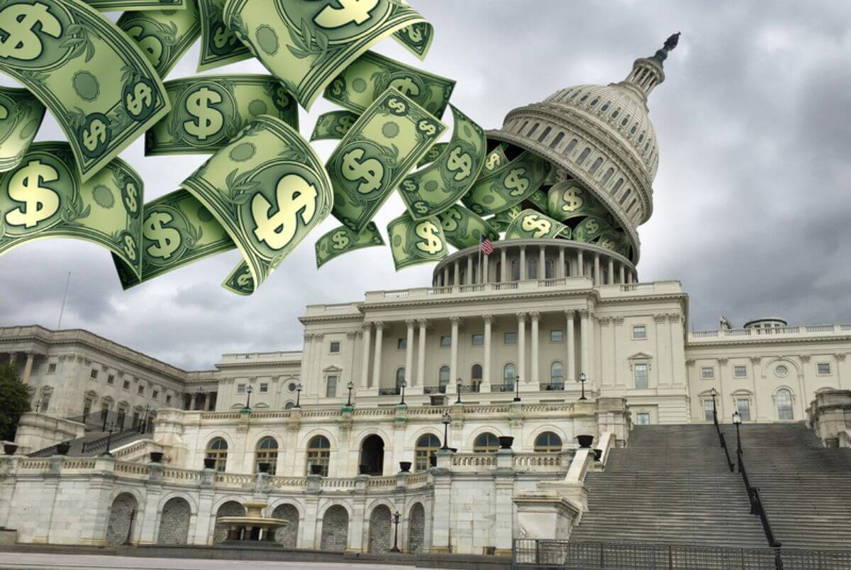 US Government Funding crisis and United States federal shutdown as a political bipartisan concept with a divided congress on capital hill with a spending bill and American deficit or debt symbol