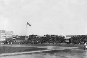 General view of Boston's Fenway Park, home of the American League baseball team the Boston Red Sox, shows stands full of fans, early 20th Century.