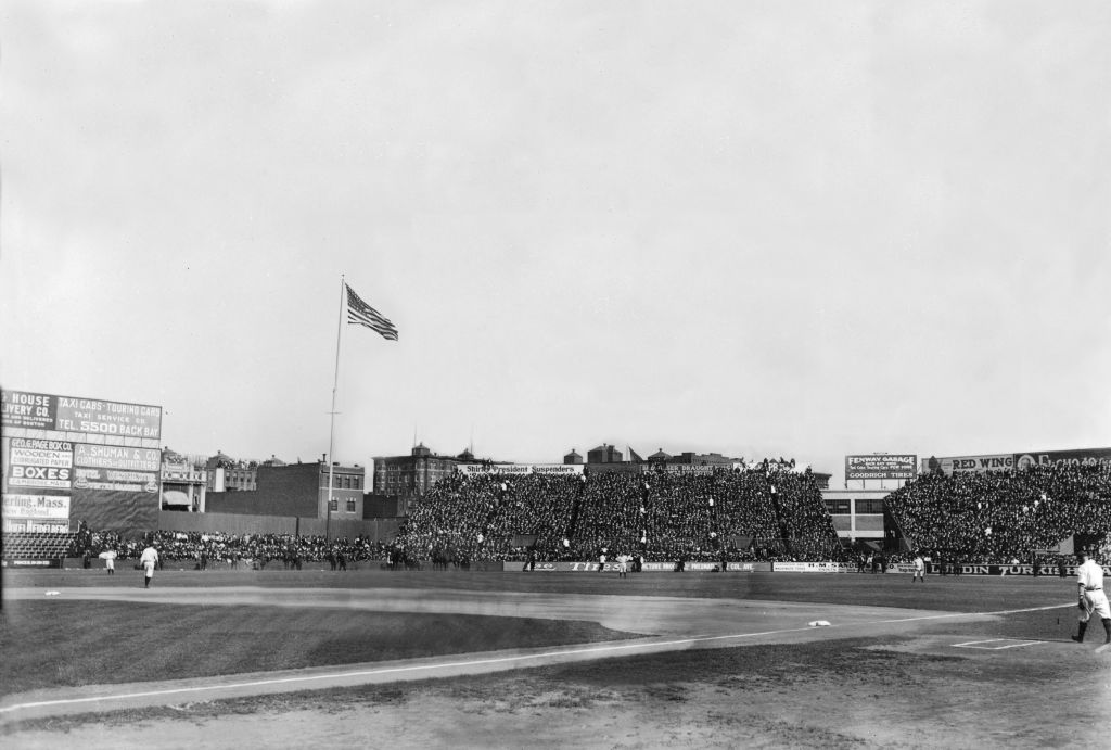 General view of Boston's Fenway Park, home of the American League baseball team the Boston Red Sox, shows stands full of fans, early 20th Century.