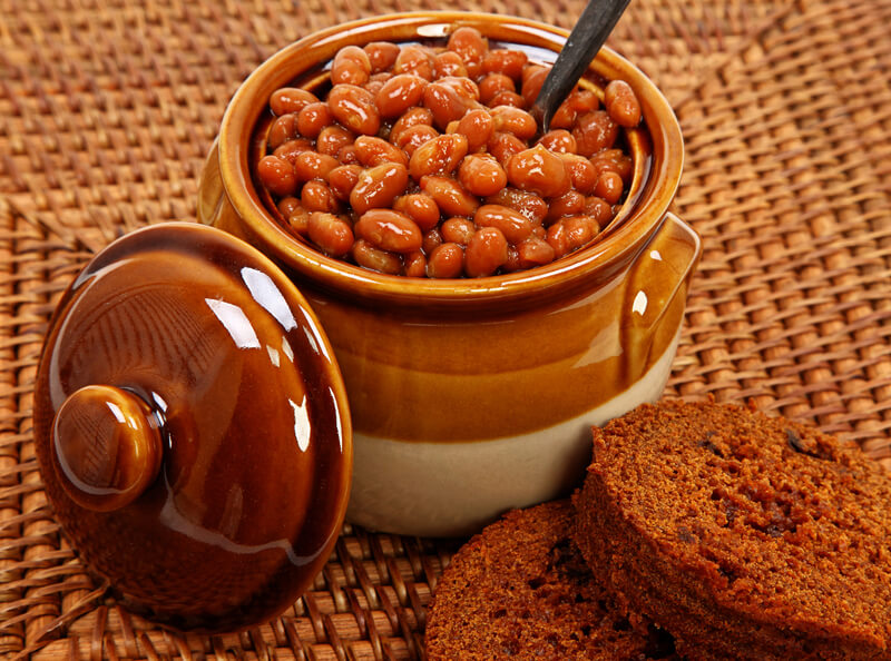 Baked Beans And Brown Bread Setting. Baked Beans And Brown Bread On Placemat