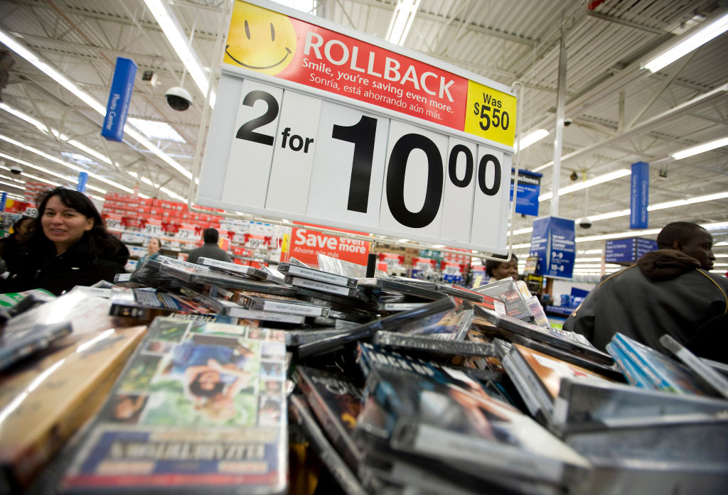 SECAUCUS, NJ - NOVEMBER 20: Bargain DVDs are displayed at the Wal-Mart store November 20, 2007 in Secaucus, New Jersey. The holiday shopping season "officially" starts Friday after Thanksgiving, typically called "Black Friday." Wal-Mart in an effort to closely align their website with it's stores, and extend the holiday shopping weekend, are posting special online-only sale prices and special "secret" deals will be posted on their website on Thanksgiving that must be purchased that day. (Photo by Jeff Zelevansky/Getty Images)
