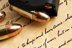 Right to keep and bear arms - US Constitution Bill of Rights with 9mm bullets and magazine