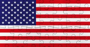 Flag of USA. Jigsaw completed flag of United States of America. Pieces of puzzle connected joined to from American flag symbol patriottism, union stars shape and stripes