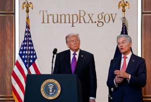Administrator for the Centers for Medicare & Medicaid Services Mehmet Oz speaks as U.S. President Donald Trump looks on during an event on drug pricing in the South Court Auditorium on the White House campus on February 5, 2026 in Washington, DC.