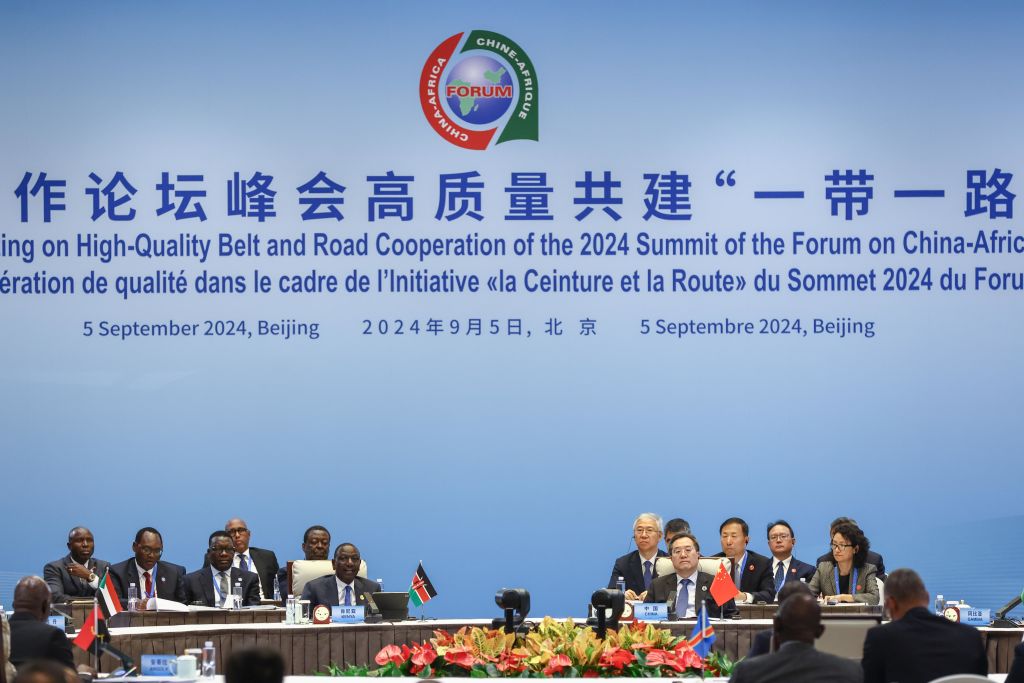 Kenya's President William Ruto (L) speaks next to China's Vice Premier Ding Xuexiang (R) during the high-level meeting on high-quality belt and road cooperation, on the sidelines of the 2024 Summit of the Forum on China-Africa Cooperation (FOCAC) at the National Convention Center on September 5, 2024 in Beijing, China.