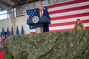 FORT BRAGG, NORTH CAROLINA - FEBRUARY 13: U.S. President Donald Trump and first lady Melania Trump visit the Fort Bragg U.S. Army base on February 13, 2026 in Fort Bragg, North Carolina. Trump visited the base to honor special forces involved in the military operation in Venezuela in early 2026. (Photo by Nathan Howard/Getty Images)