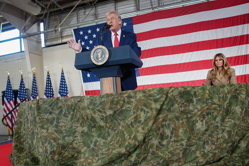 FORT BRAGG, NORTH CAROLINA - FEBRUARY 13: U.S. President Donald Trump and first lady Melania Trump visit the Fort Bragg U.S. Army base on February 13, 2026 in Fort Bragg, North Carolina. Trump visited the base to honor special forces involved in the military operation in Venezuela in early 2026. (Photo by Nathan Howard/Getty Images)