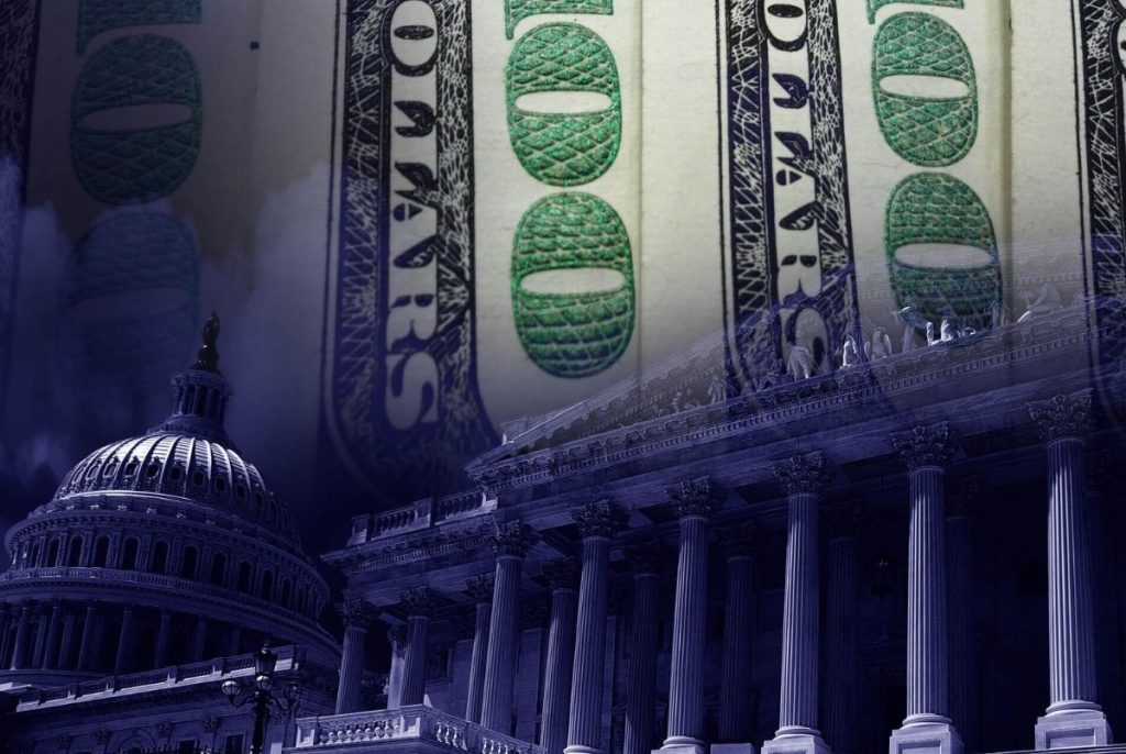 The US Capitol in Washington DC with hundred dollar bills