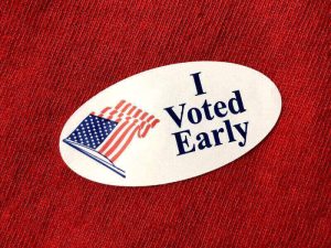 I voted early sitcker. I voted early sticker on red fabric shirt