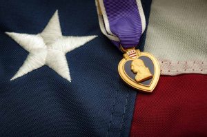 The United States Purple Heart medal, a decoration awarded to military personnel wounded or killed in action
