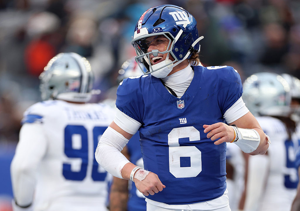 Jaxson Dart #6 of the New York Giants celebrates a fourth quarter touchdown against the Dallas Cowboys at MetLife Stadium on January 04, 2026 in East Rutherford, New Jersey.