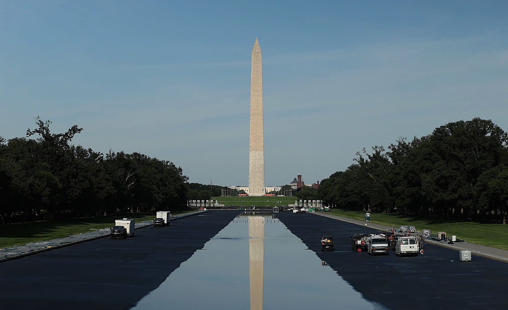 WASHINGTON, DC - JUNE 04: The Washington Monument is seen as the Lincoln Memorial Reflecting Pool fills with water on June 04, 2026 in Washington, DC. The repainting of the reflecting pool continues ahead of America's 250th event celebrations. (Photo by Alex Wong/Getty Images)