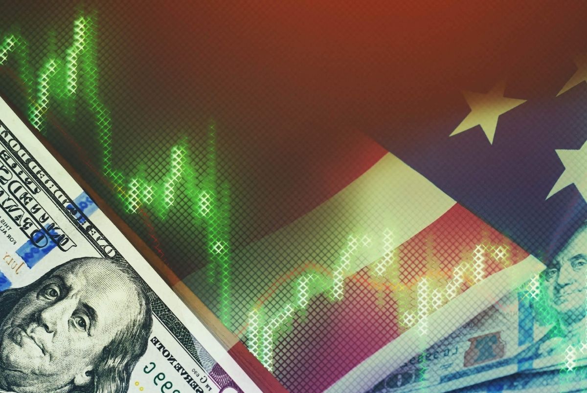 US dollar bills on background with dynamics of exchange rates. Trading and financial risk concept