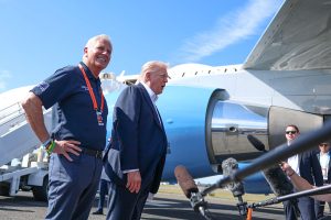 U.S. President Donald Trump stands with Bruce Blakeman, County Executive of Nassau County, New York, as he speaks with the media after arriving at the Republic Airport on Air Force One on September 26, 2025 in Farmingdale, New York.