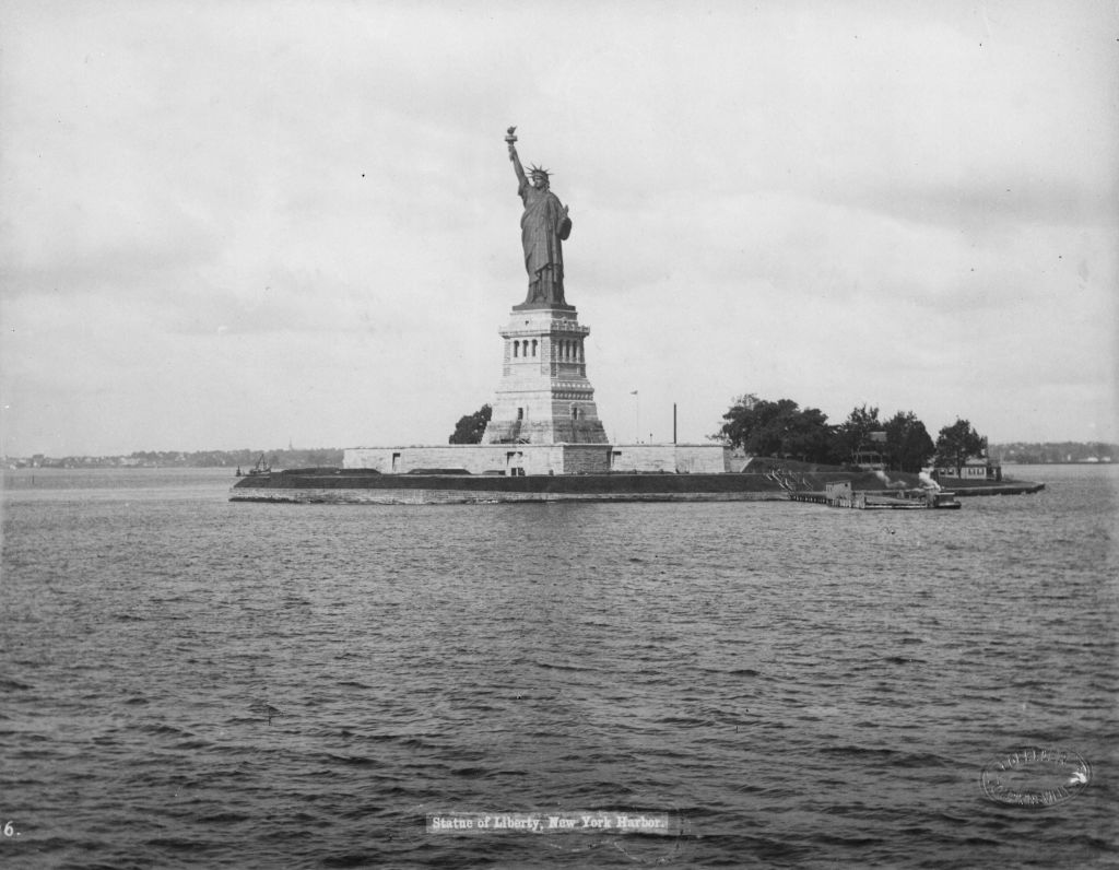 1893: The statue of Liberty on Liberty Island in New York harbour. Designed by the French sculptor Frederick Bartholdi, the statue was presented to the United States by France in 1876.