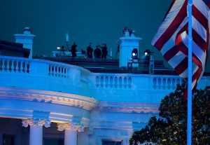 President Trump Hosts UFC Freedom 250 Fight Topuria v Gaethje At The White House WASHINGTON, DC - JUNE 14: U.S. Secret Service agents are seen atop the White House during UFC Freedom 250 on the South Lawn on June 14, 2026 in Washington, DC. President Trump is hosting a series of Ultimate Fighting Championship matches on his 80th birthday, which the White House is calling "a once-in-a-generation celebration of the American fighting spirit.” (Photo by Chip Somodevilla/Getty Images)