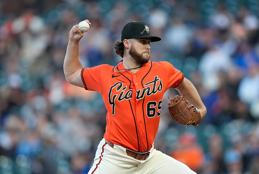 Landen Roupp #65 of the San Francisco Giants pitches against the Chicago Cubs in the top of the first inning at Oracle Park on June 12, 2026 in San Francisco, California.