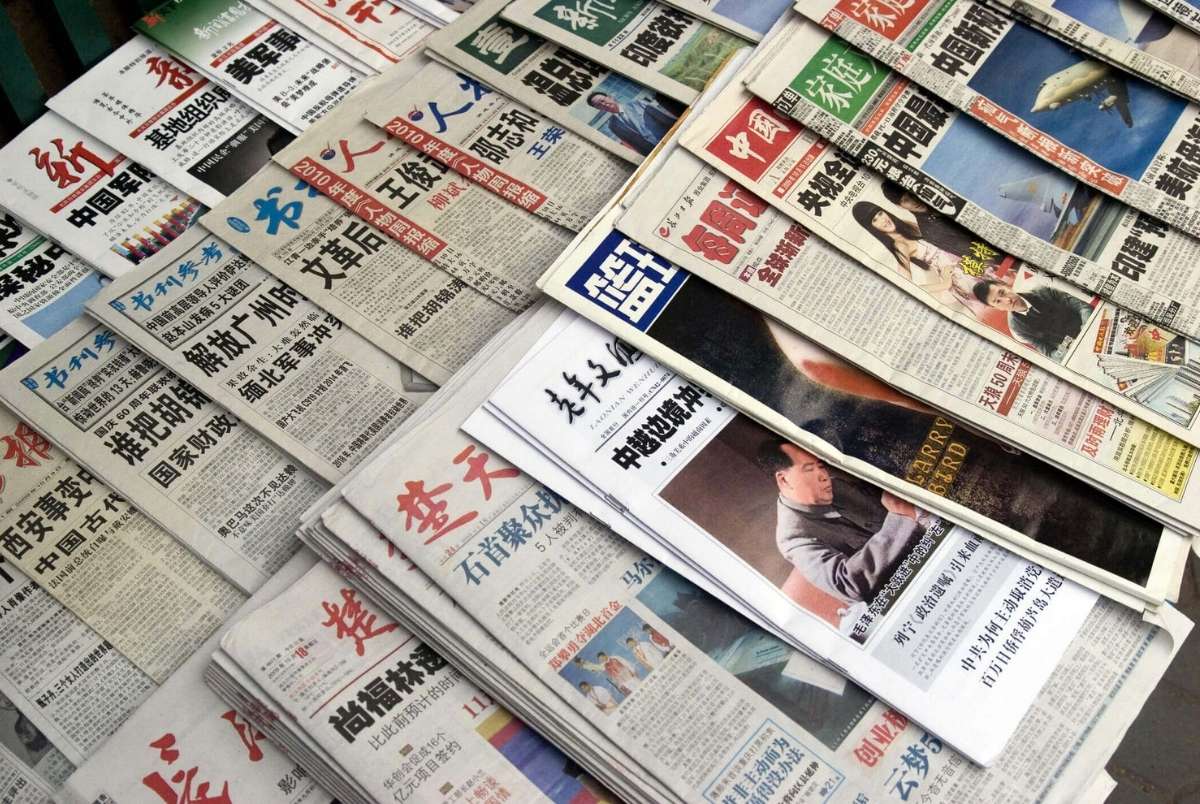 Lots of updated newspapers for sold in the street in WuHan city of China. These newspapers was published daily or monthly in China. The photo was taken in the street in WuHan on 19th of Oct. 2009.