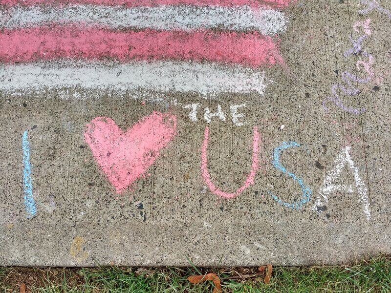 I Love The USA, I Heart The USA. In Lincoln Park, this patriotic sidewalk chalk drawing was an entrant in the Junior Woman’s Club's 11th Annual Children's Chalk Drawing Contest. This photo was taken in Rutherford, New Jersey, USA, on July 4th 2018.