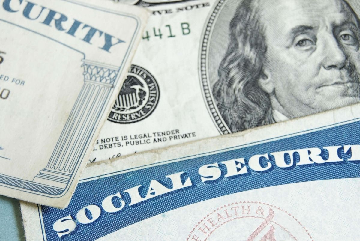Social security cards and US money - retirement concept