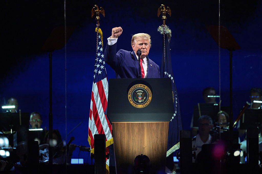 WASHINGTON, DC - JULY 04: U.S. President Donald Trump raises his fist while speaking at "Salute to America 250" Fourth of July celebrations on the National Mall on July 04, 2026 in Washington, DC. Americans are celebrating the nation’s 250th anniversary amidst an extreme heat wave bringing dangerous triple digit temperatures to much of the eastern United States. (Photo by Chip Somodevilla/Getty Images)