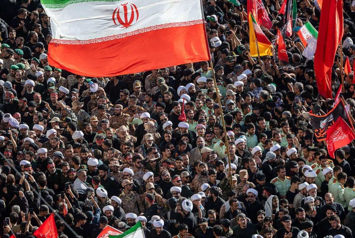 MASHHAD, IRAN - JULY 09: Iranian Revolutionary Guard soldiers and clerics walk in the procession carrying the coffin of Iran's slain Supreme Leader Ayatollah Ali Khamenei on July 9, 2026 in Mashhad, Iran. The former leader will be laid to rest at the Imam Reza Holy Shrine, the most important Muslim site in Iran. Khamenei and members of his family were killed on February 28 during U.S.-Israeli strikes at the beginning of the war, bringing an end to his 36-year rule over Iran. Thousands of mourners packed Iran's spiritual capital and second largest city today in his hometown of Mashhad, Iran, concluding a six-day state funeral that began on July 4 and took place across multiple cities in Iran and Iraq. (Photo by John Moore/Getty Images)