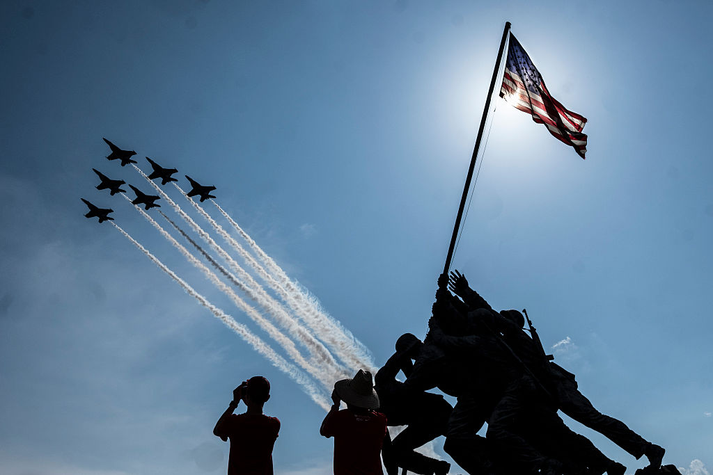ARLINGTON, VA - JULY 4: A Blue Angels flyover is seen coming over the Marine Corps Memorial on July 4, 2026 from Arlington, Virginia. Numerous events, activities, and fireworks are planned in celebration of America's 250th Anniversary amidst an extreme heat wave bringing dangerous triple digit temperatures to much of the eastern United States. (Photo by Pete Marovich/Getty Images)