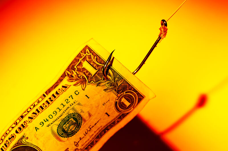 Money Bait. Dollar Bill on a Hook. Phishing Concept - New Email Scams To Beware of.