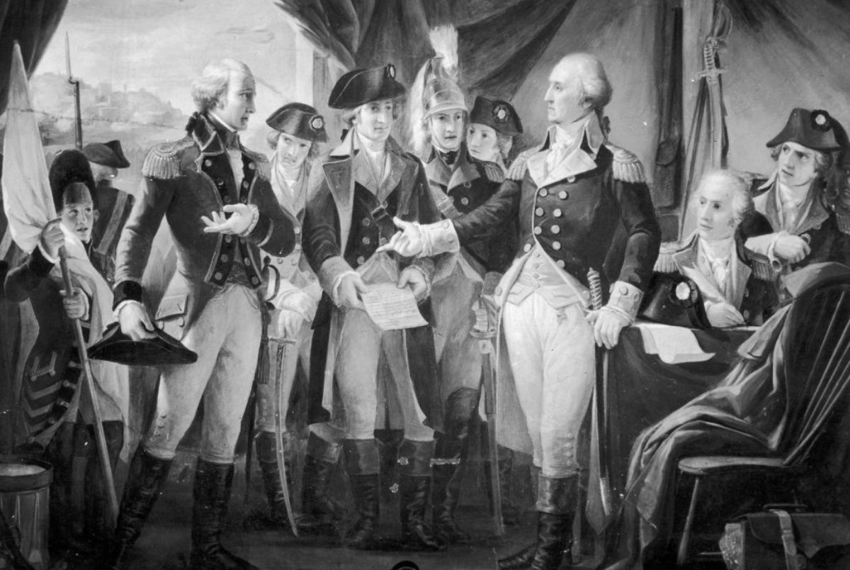 October 1789: American General and statesman George Washington declining to accept terms, after the siege of Yorktown, from British General Charles Cornwallis, 1st Marquess Cornwallis (left), whose subsequent surrender practically ended the American War of Independence. (Photo by Three Lions/Getty Images)